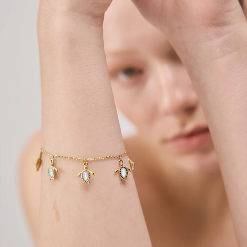 Turtle Armkette White Breeze Gold - Image 3